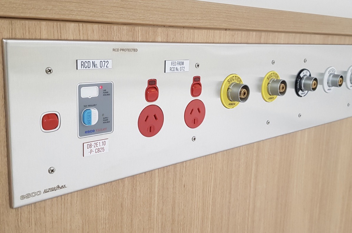 Medical service panel installation with gas outlets and power supply