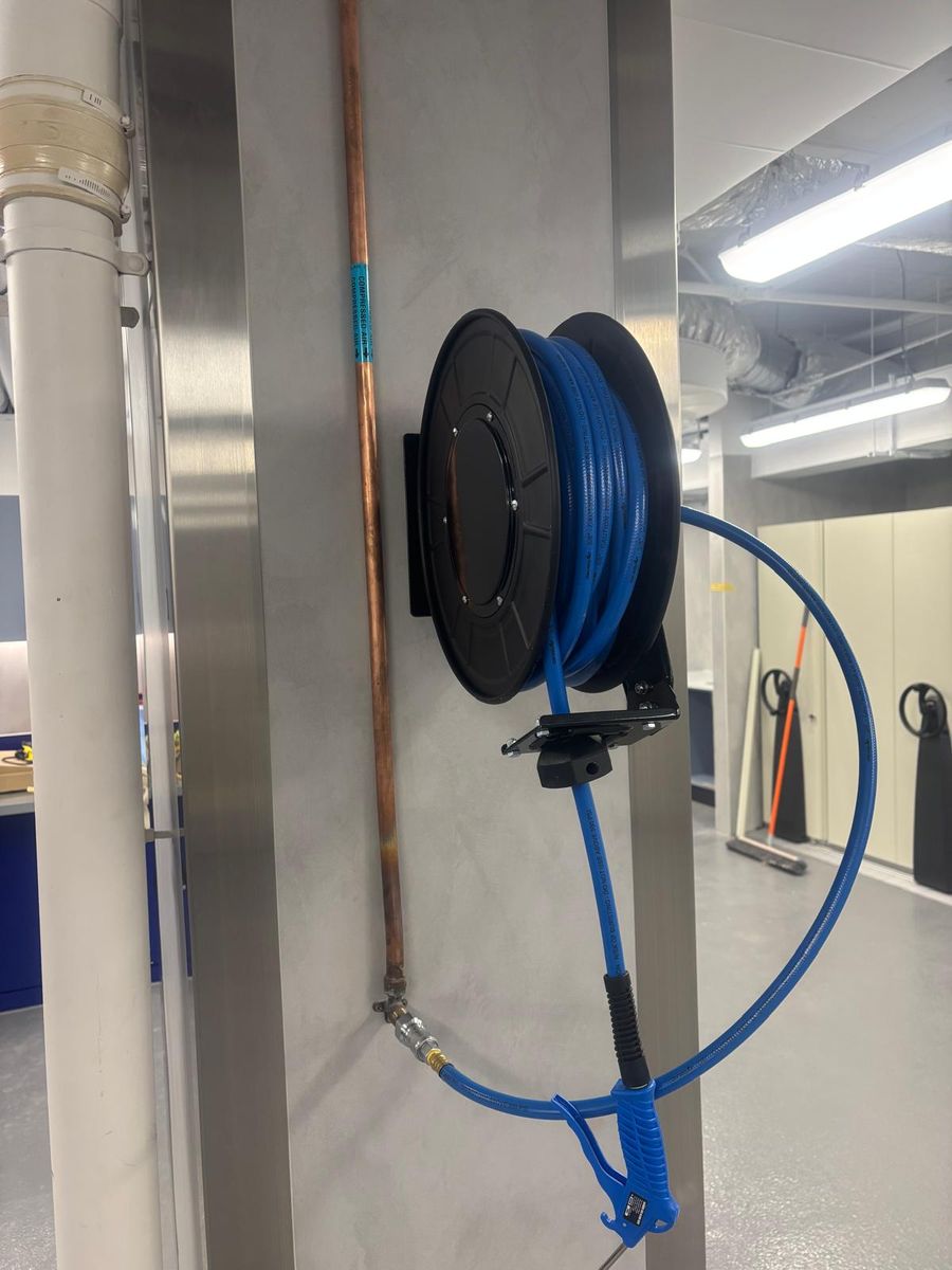 Compressed air hose reel fed from labelled copper reticulation
